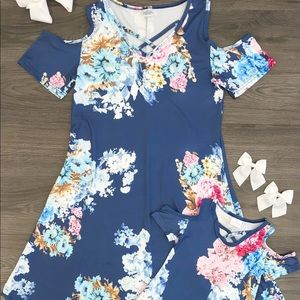 Mom and daughter open shoulder floral dress